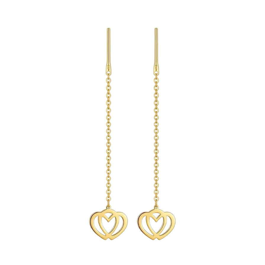 Gold heart-shaped earrings on a white background