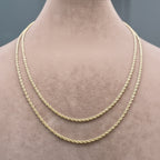 Gold chain necklace on a mannequin neck with measurements displayed.