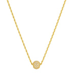 Gold necklace with a spherical pendant on a white background