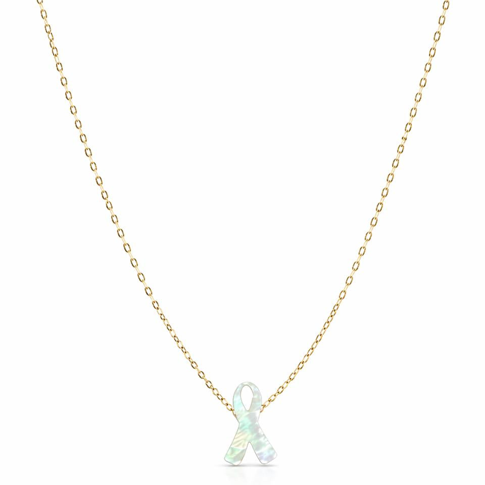 Necklace with a white ribbon pendant on a gold chain against a white background