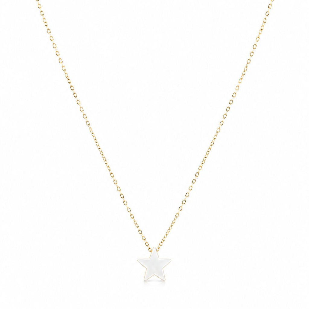 Gold necklace with a star-shaped pendant on a white background