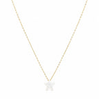 Gold necklace with a star-shaped pendant on a white background
