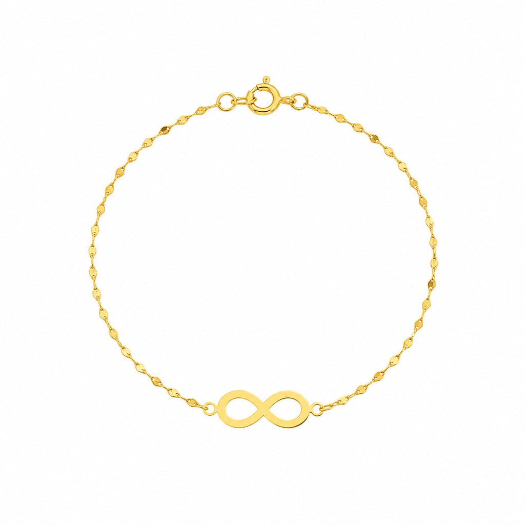 Gold bracelet with an infinity symbol on a white background