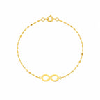 Gold bracelet with an infinity symbol on a white background