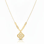 Gold necklace with a pendant on a blue mannequin