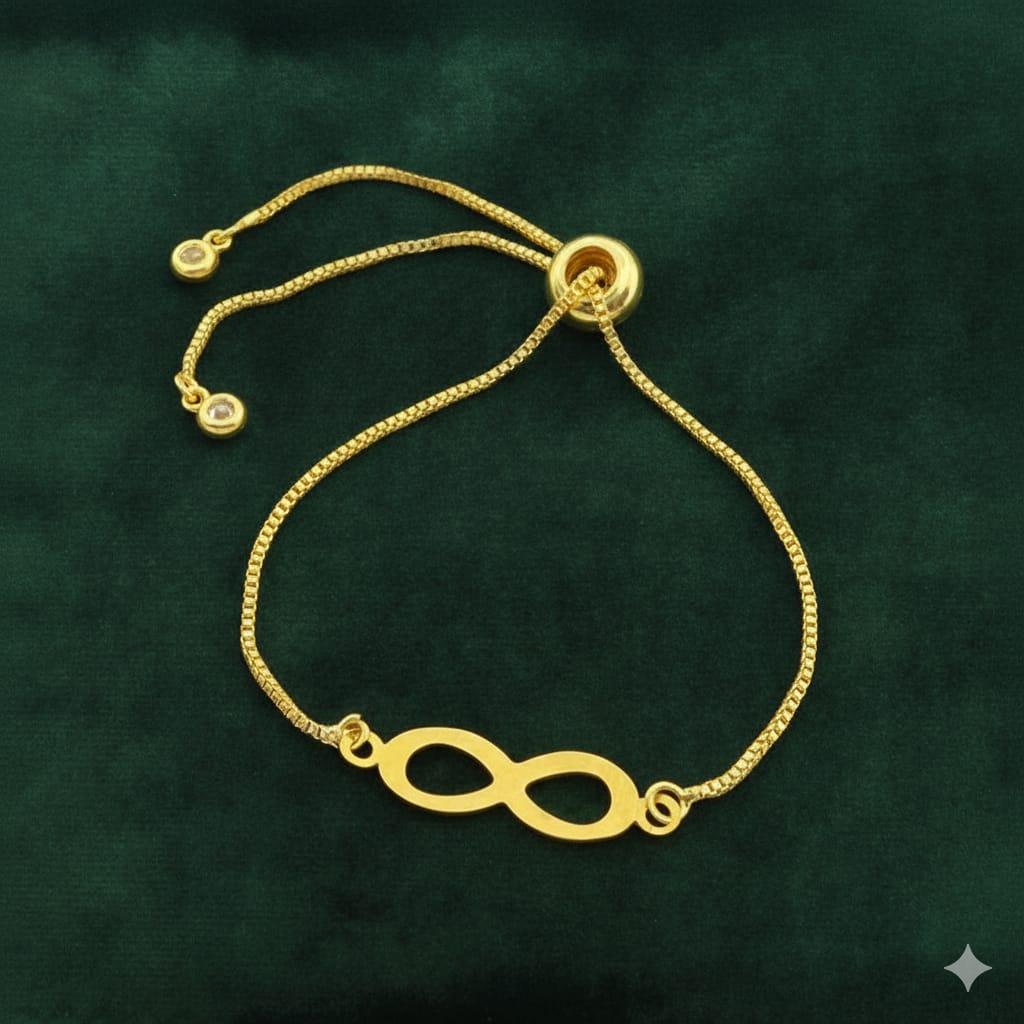 Gold bracelet with an infinity symbol on a green background