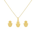Gold hamsa hand necklace and earrings on a white background