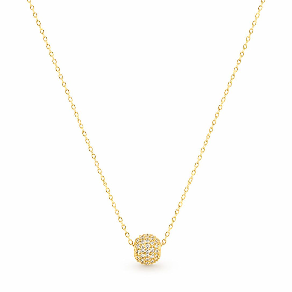 Gold necklace with a round pendant on a white background