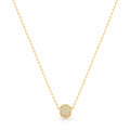 Gold necklace with a round pendant on a white background