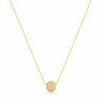 Gold necklace with a round pendant on a white background