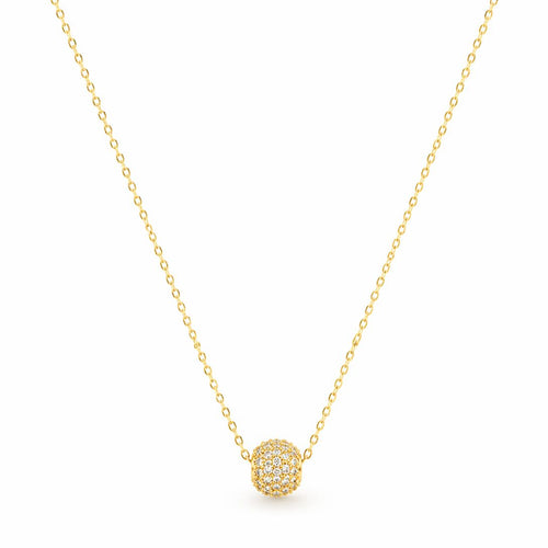 Gold necklace with a round pendant on a white background