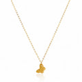 Gold necklace with a small pendant on a white background