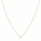 Gold chain necklace on a white background