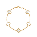 Gold bracelet with white clover-shaped charms on a white background
