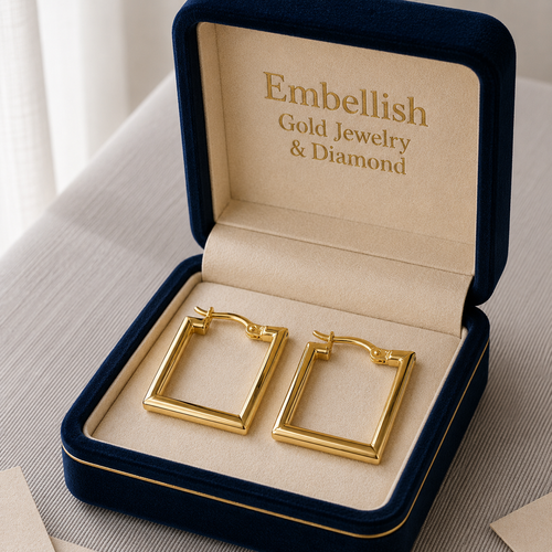 Gold hoop earrings in a 'Embellish Gold Jewelry & Diamond' box.