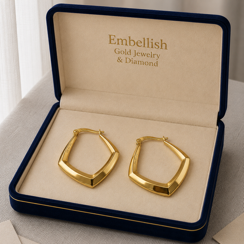 Gold hoop earrings in a 'Embellish Gold Jewelry & Diamond' box.