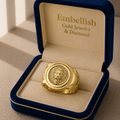 Gold ring with lion head design in a 'Embellish Gold Jewelry & Diamond' box.